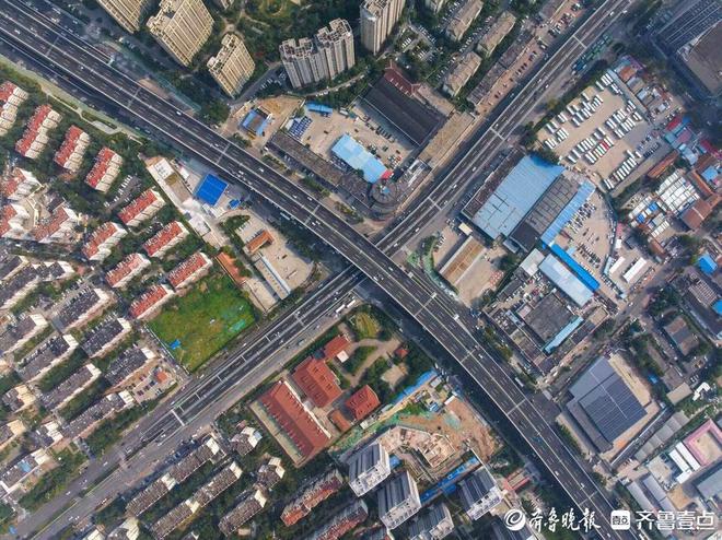 米乐·M6长沙路、金水路跨线桥通车青岛主城区城市交通路网体系再升级